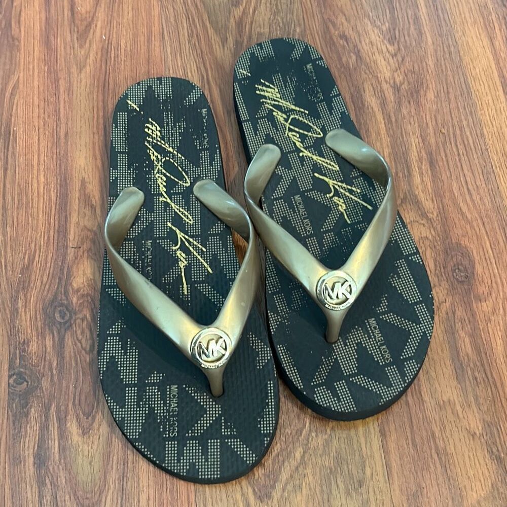 Michael Kors gold flip-flops MK